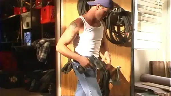 a pretty and cute chick with little braids fucks with a young handsome guy in the workshop