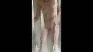 iPhone catches horny tattooed step-mom masturbating in the shower in hot portrait video