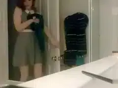 Pretty dress on a girl undressing to shower