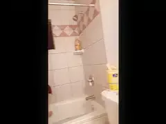 Wife cleans tub in the nude