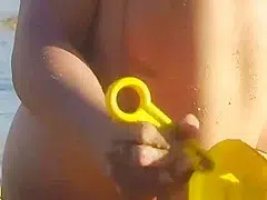 Hot girl in yellow bikini at the beach
