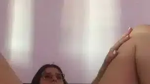 Beautiful latina girl showing and fingering her pussy