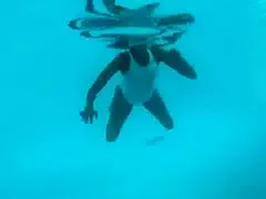 Bootylicious chick shows her tits under the water