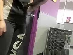 Curvy chick wearing black sports pants