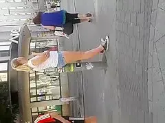 Blonde girl in tight jeans shorts