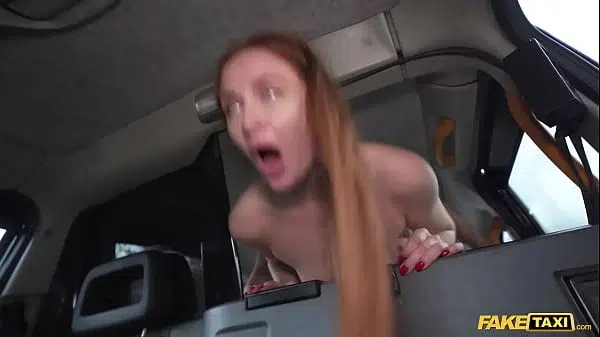 Fake Taxi Redhead MILF in sexy nylons rides a big fat dick in a taxi