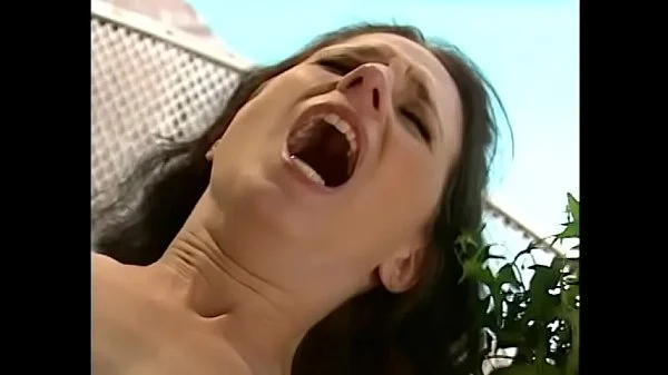 Hot brunette with a great body  Lena Ramon gets her twat pounded on the glass table near the house
