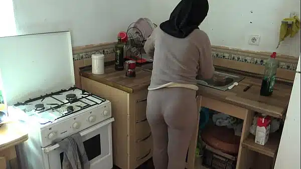 Arab cleaning maid in Dubai is shocked when I flash my big cock to her in the kitchen