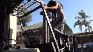 She climbs a forklift and Pedal Pumps in Sexy Tights with Boots